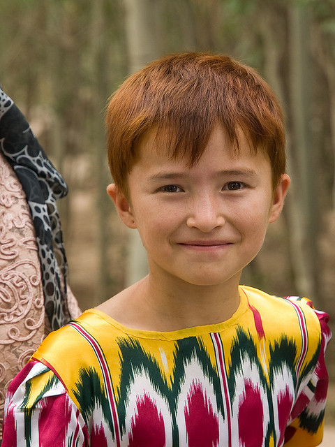 A Uyghur girl with red hair from China’s Xinjiang region